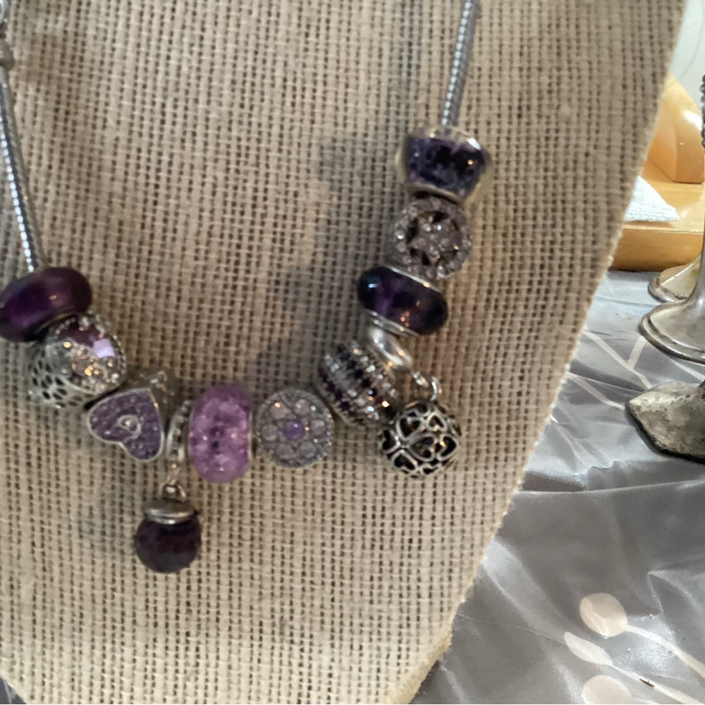Beautiful set from Avon with many charms